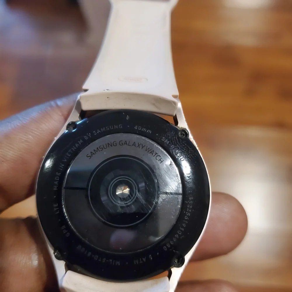 Samsung Smartwatch with Silver Bezel and Cream Band